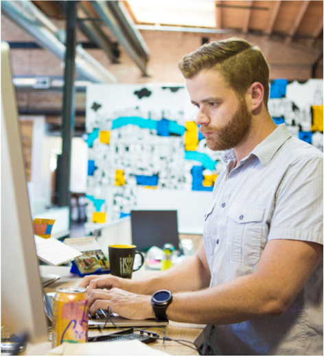 Employee working at the studio office
