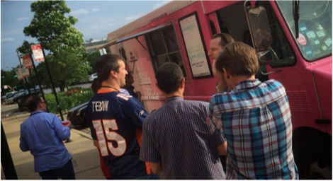 Bounteous employees getting lunch from food trucks