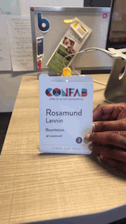 gif showing the front and inside of the confab 2019 badge