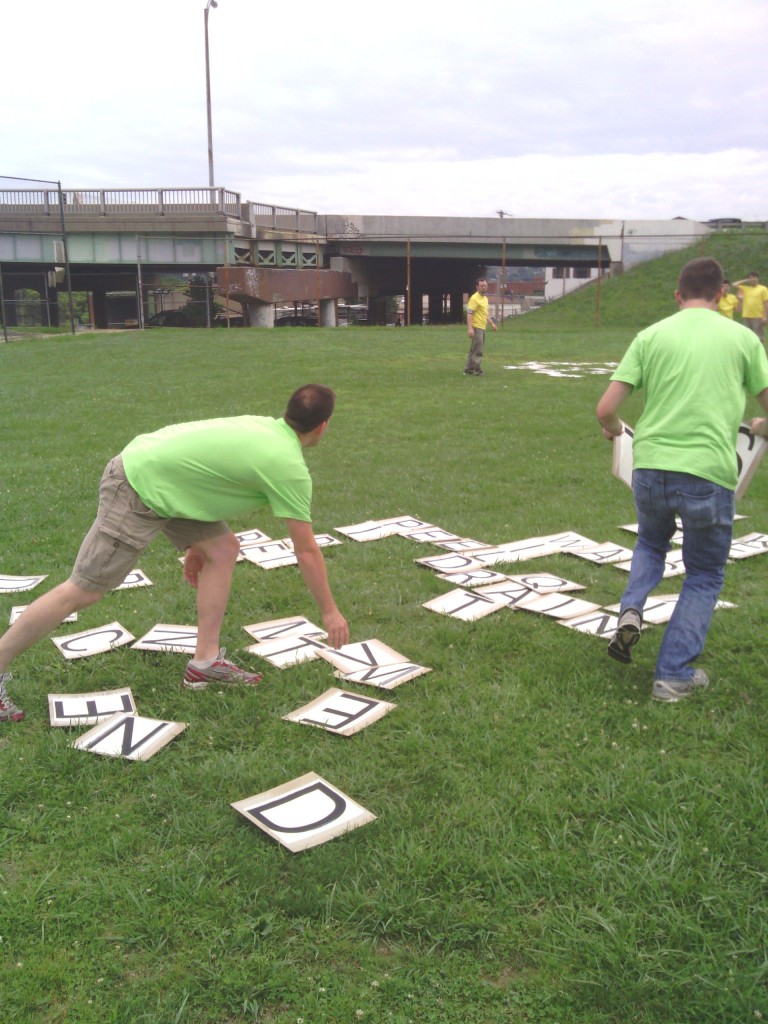 The LunaMetrics Team plays a game of baseball field-sized Bananagrams