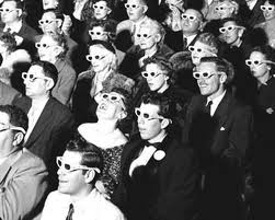 theater audience wearing 3D glasses theater audience wearing 3D glasses